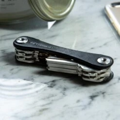 KeySmart Leather Compact Key Holder -Multifunctional Tool Store KS019BLKLEA KeySmart Black Leather in Use with Keys