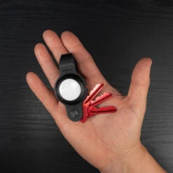KeySmart Air Compact 2-in-1 AirTag And Key Holder -Multifunctional Tool Store KeySmartAir Blk AirKeys Red Lifesltyle Inhand Open 2000x2000 2000x 0f10aed9 066b 406c afd4 2794d3bac8dc