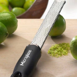 Microplane Premium Classic Zester/Grater 11 Microplane Premium Classic Zester/Grater -Multifunctional Tool Store MP46020 Microplane Grater Zester Close Up