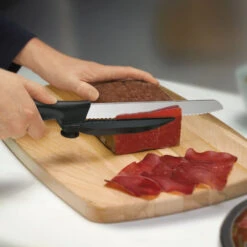 Swiss Classic 8" Serrated DUX-Knife With Adjustable Slicing Guide By Victorinox -Multifunctional Tool Store vf6866321 thinslices x1000 f5168284 3453 4254 8e48 9d264357fcf8